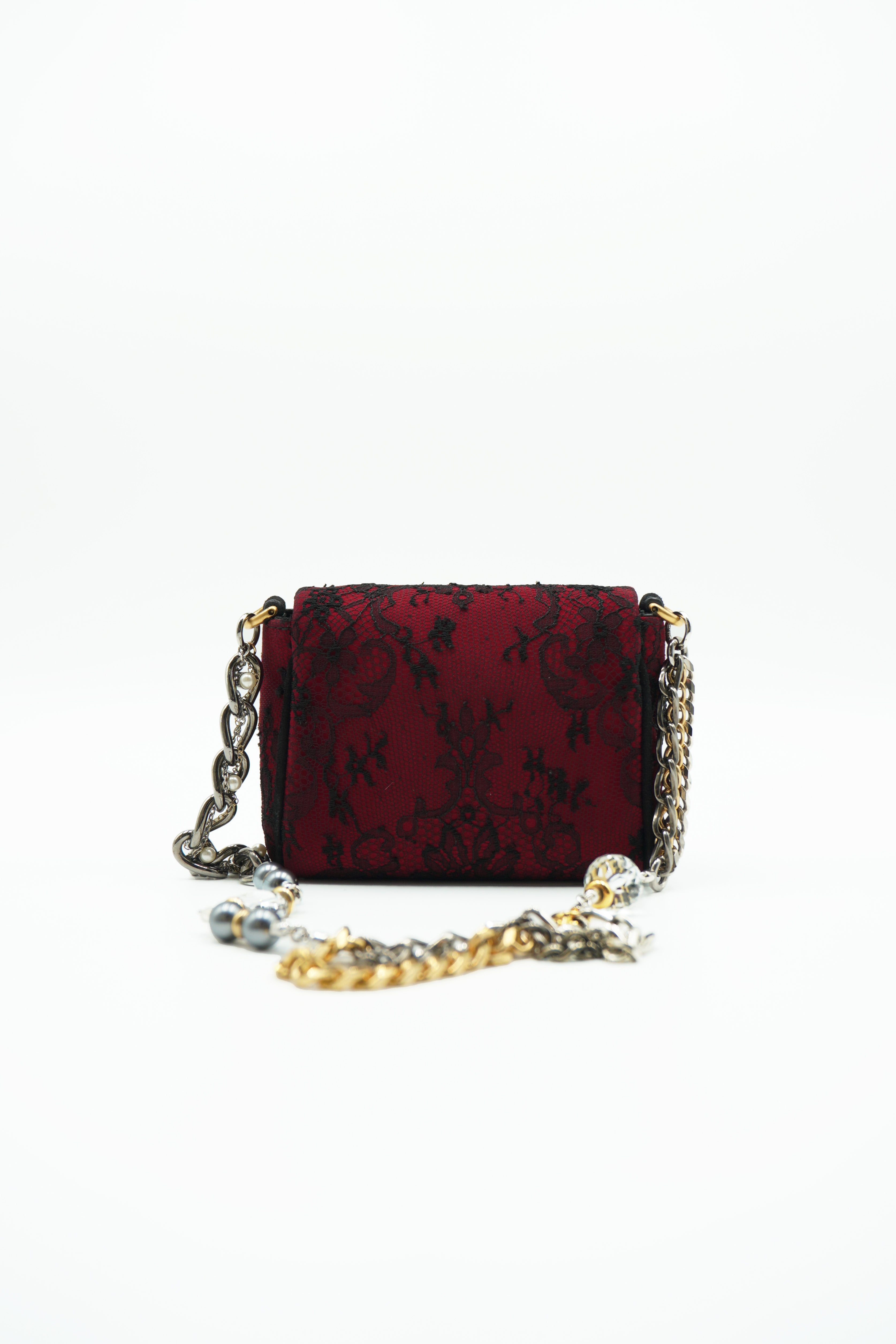 Bolso Dolce & Gabbana de ante rojo y encaje negro