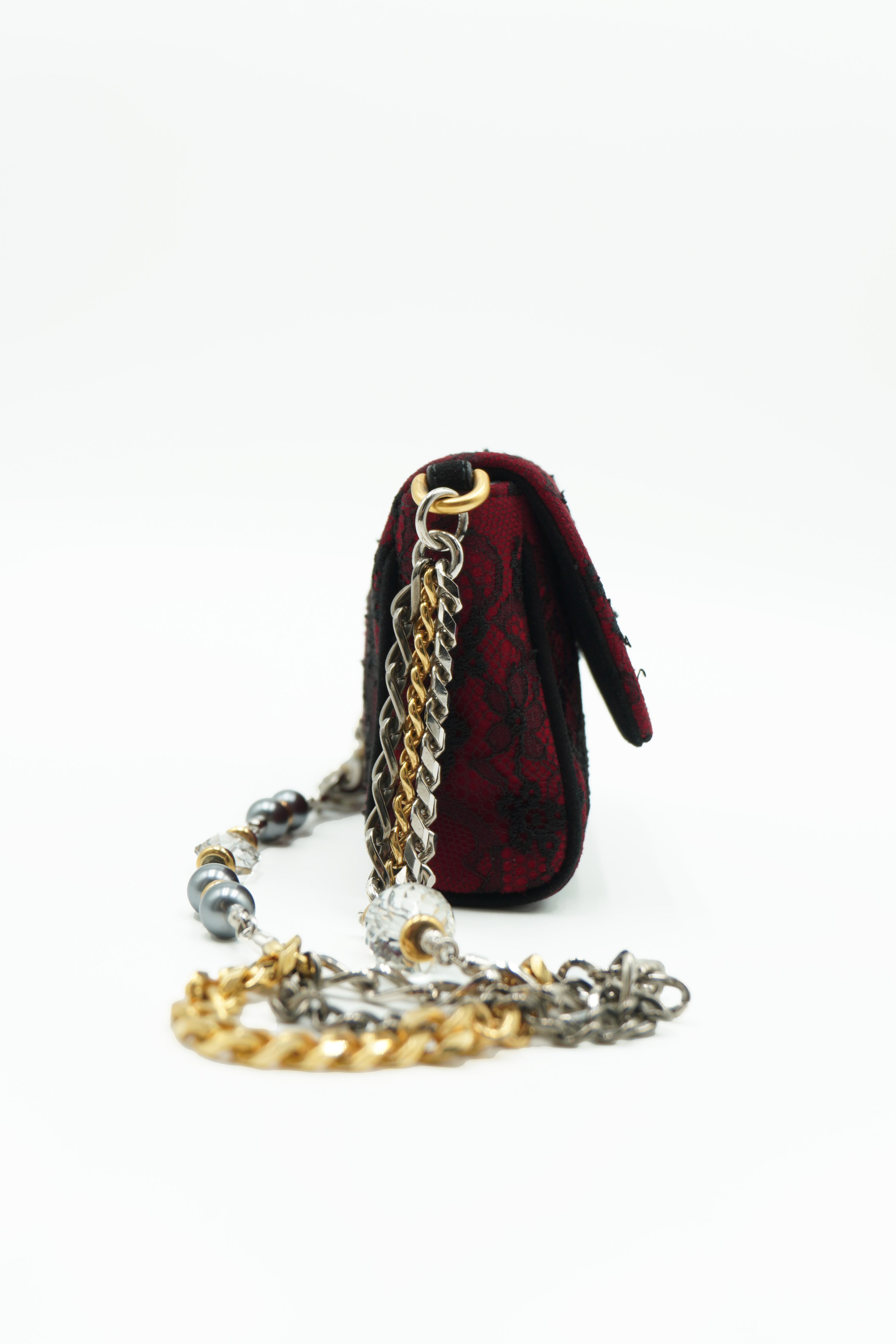 Bolso Dolce & Gabbana de ante rojo y encaje negro