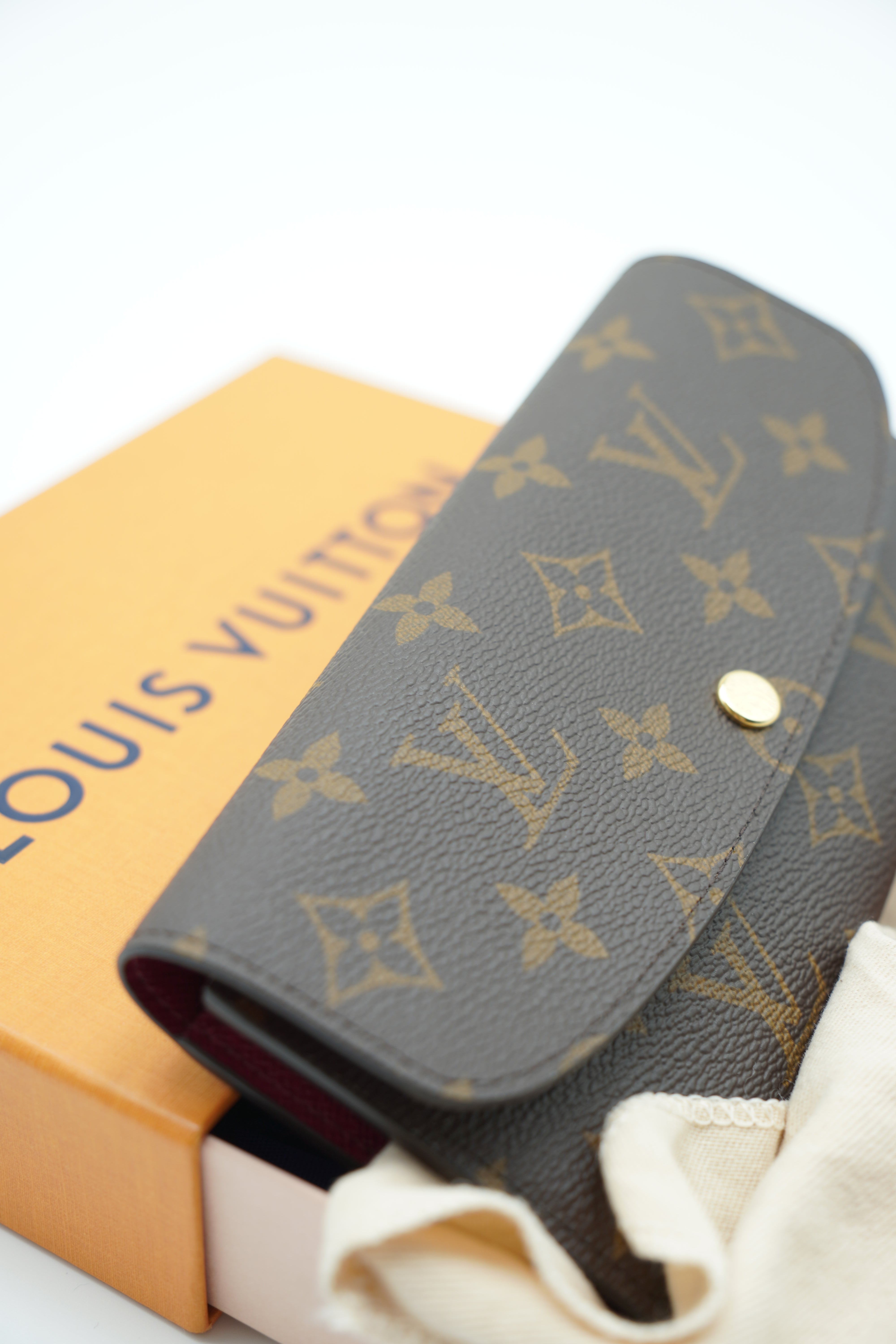 Cartera con monograma Louis Vuitton Emilie