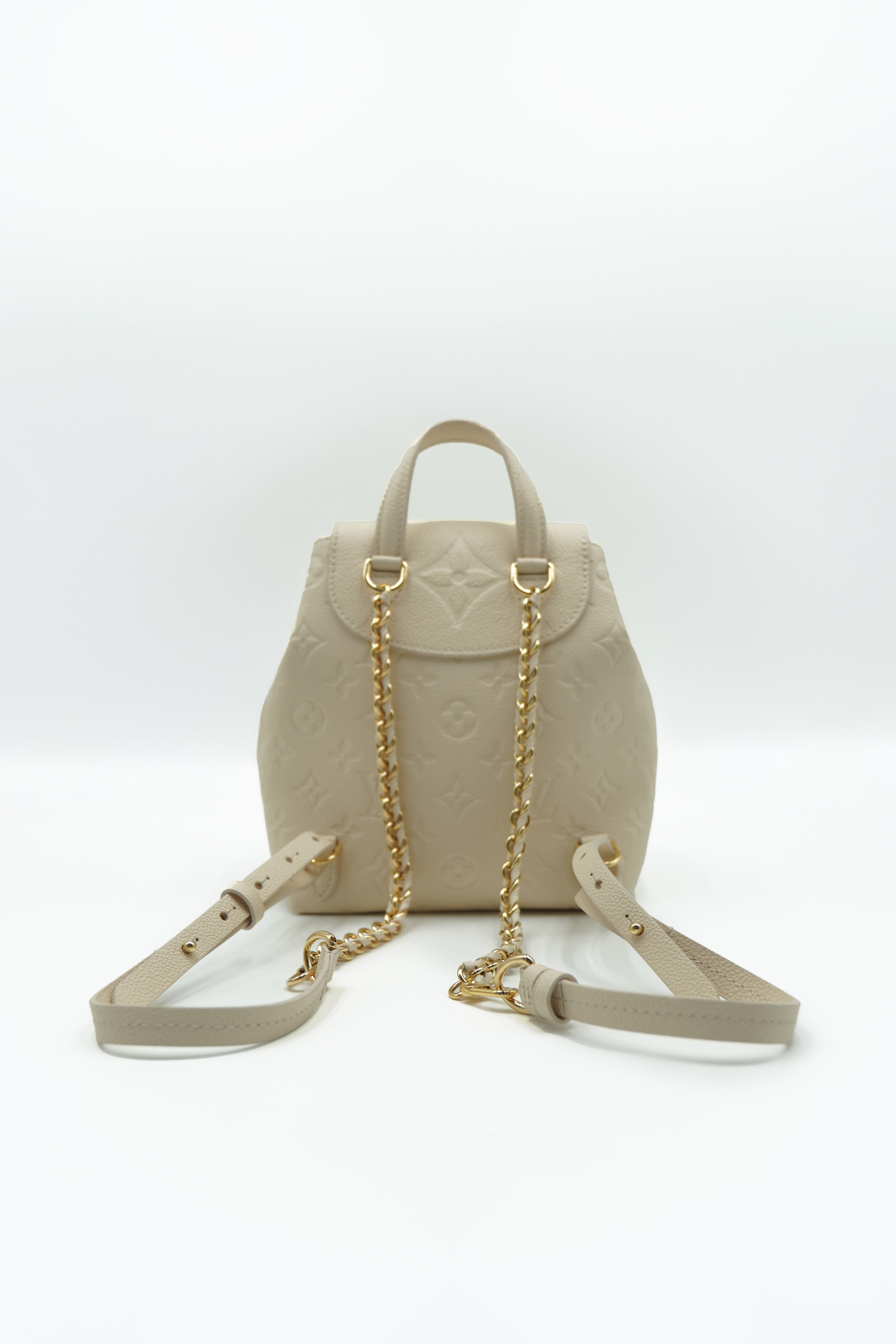 Mochila de piel Louis Vuitton Backup color leche