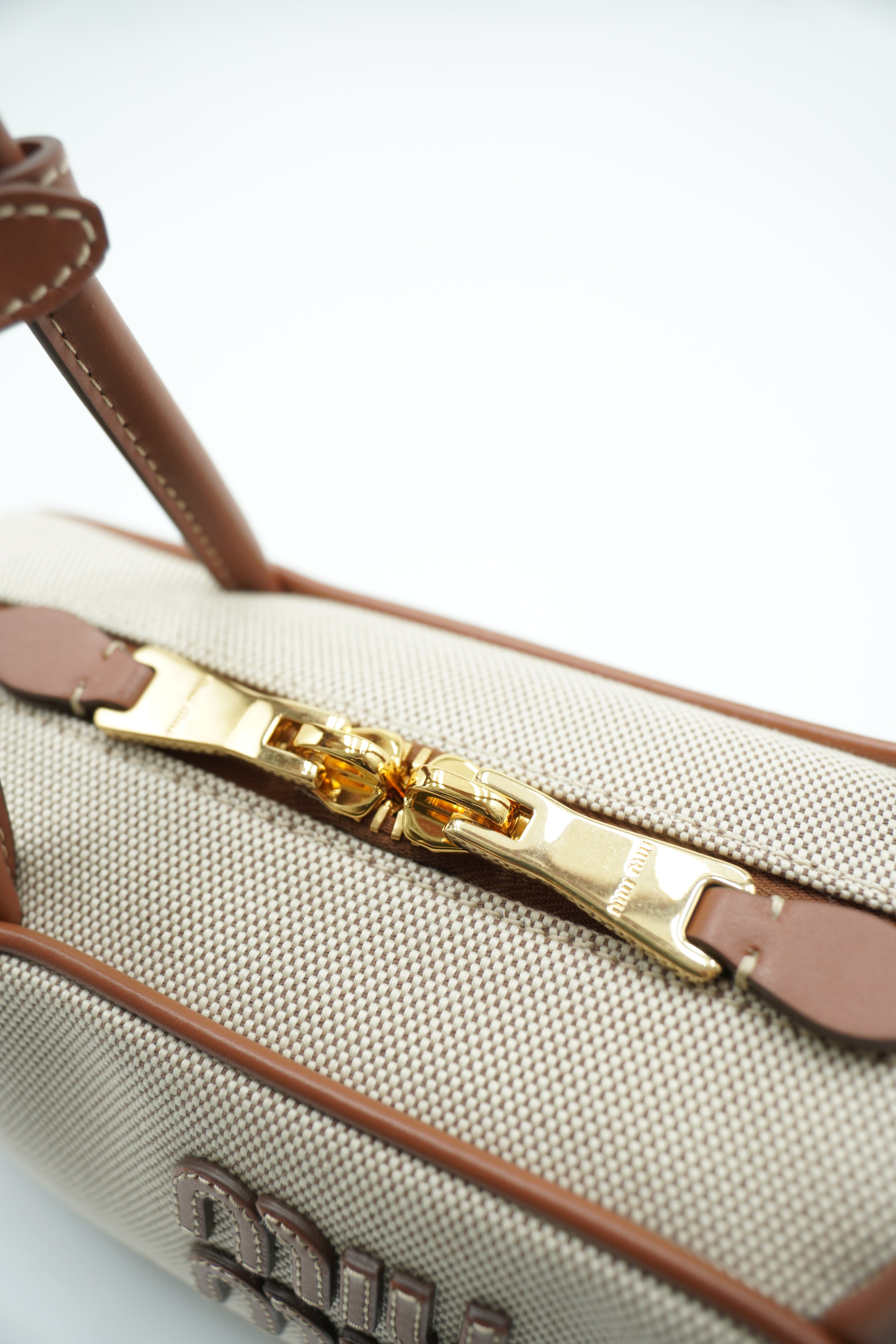 Bolso Miu Miu Beau de lona y piel pequeño