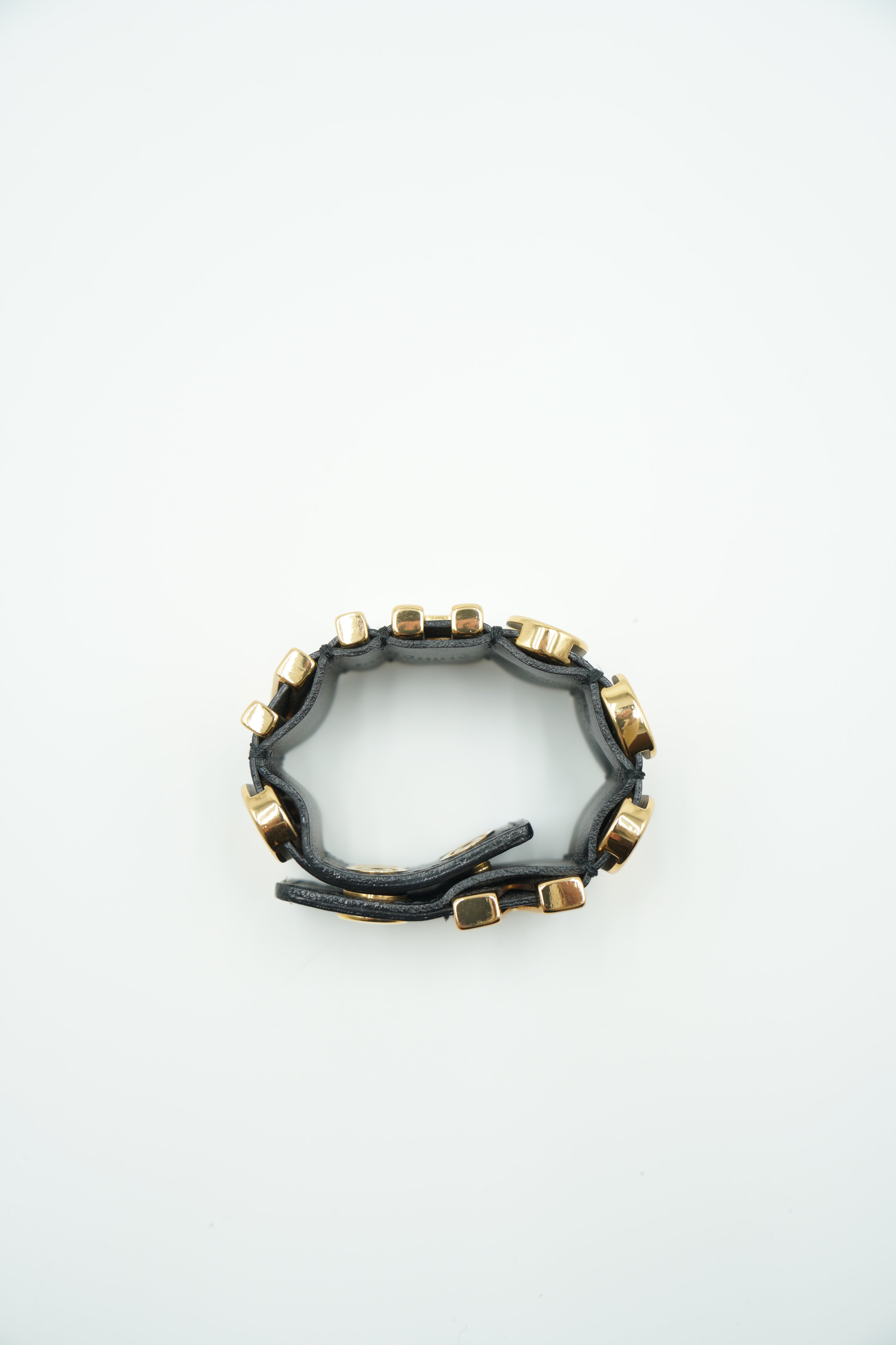 Pulsera con logotipo de Moschino en oro y cuero