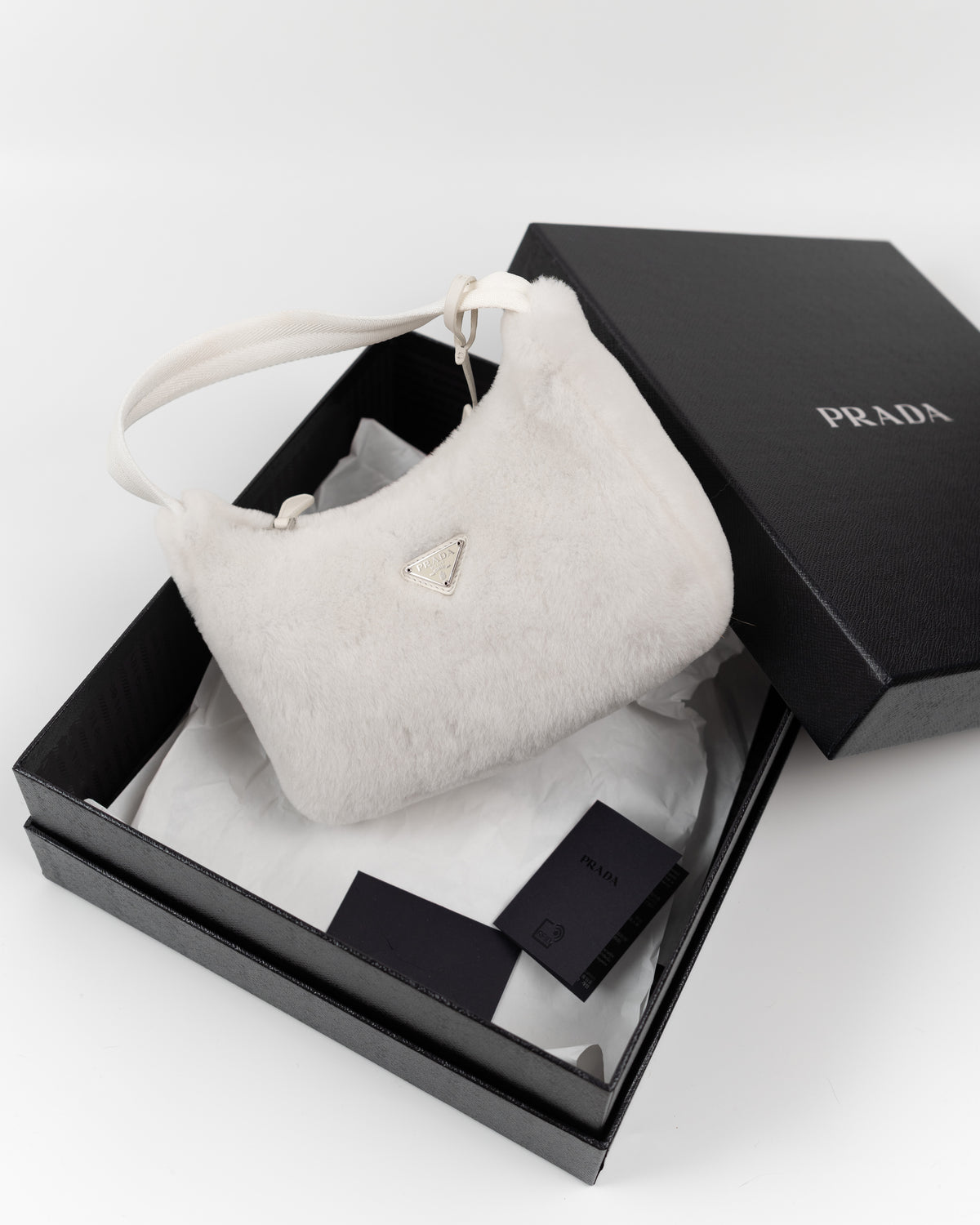 Prada Borsa Re-Edition 2000 Mini Pelliccia Bianca preloved certificata autentica - Aurea Luxury Lab