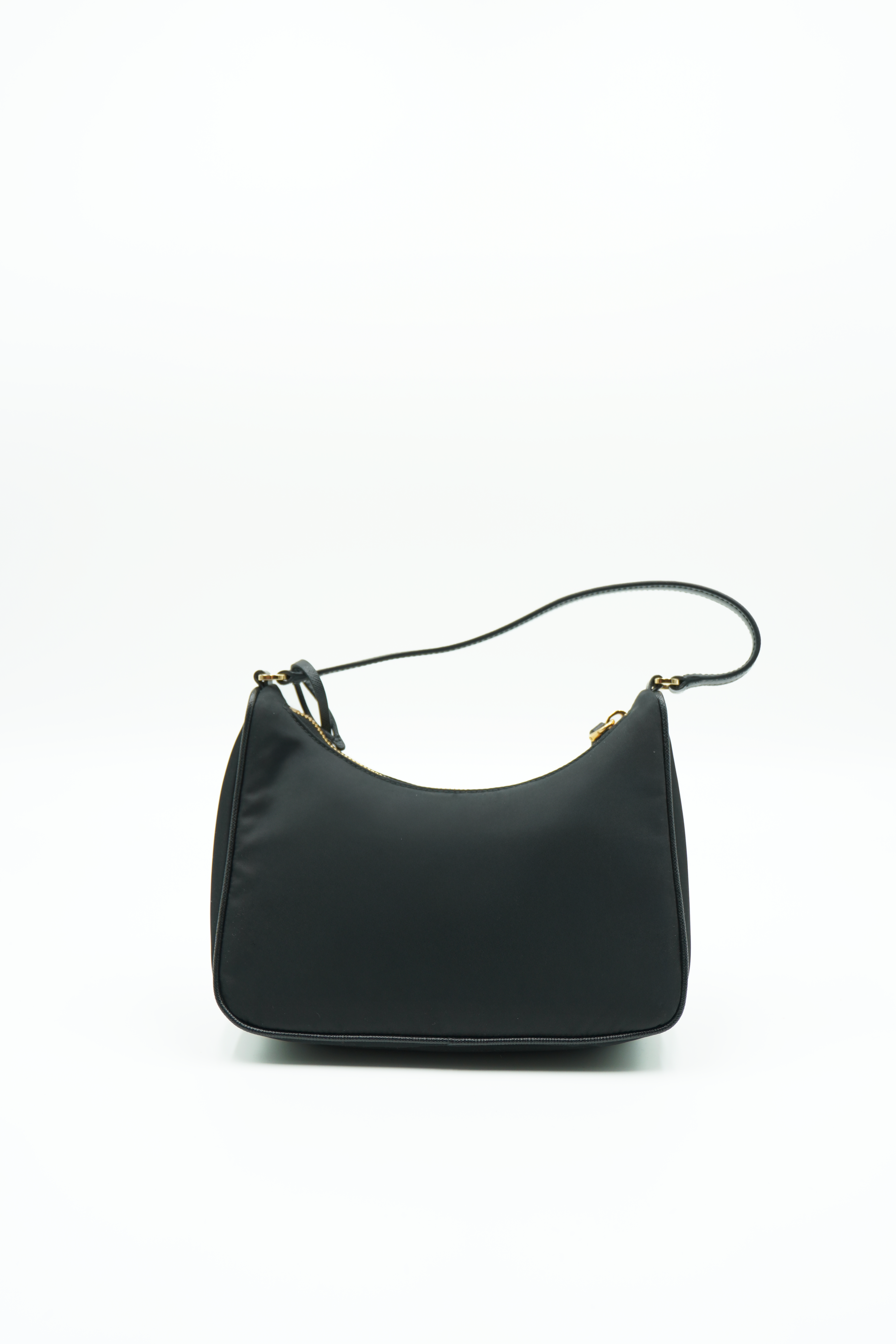 Minibolso Prada reedición 2005 en Re-Nylon y Saffiano