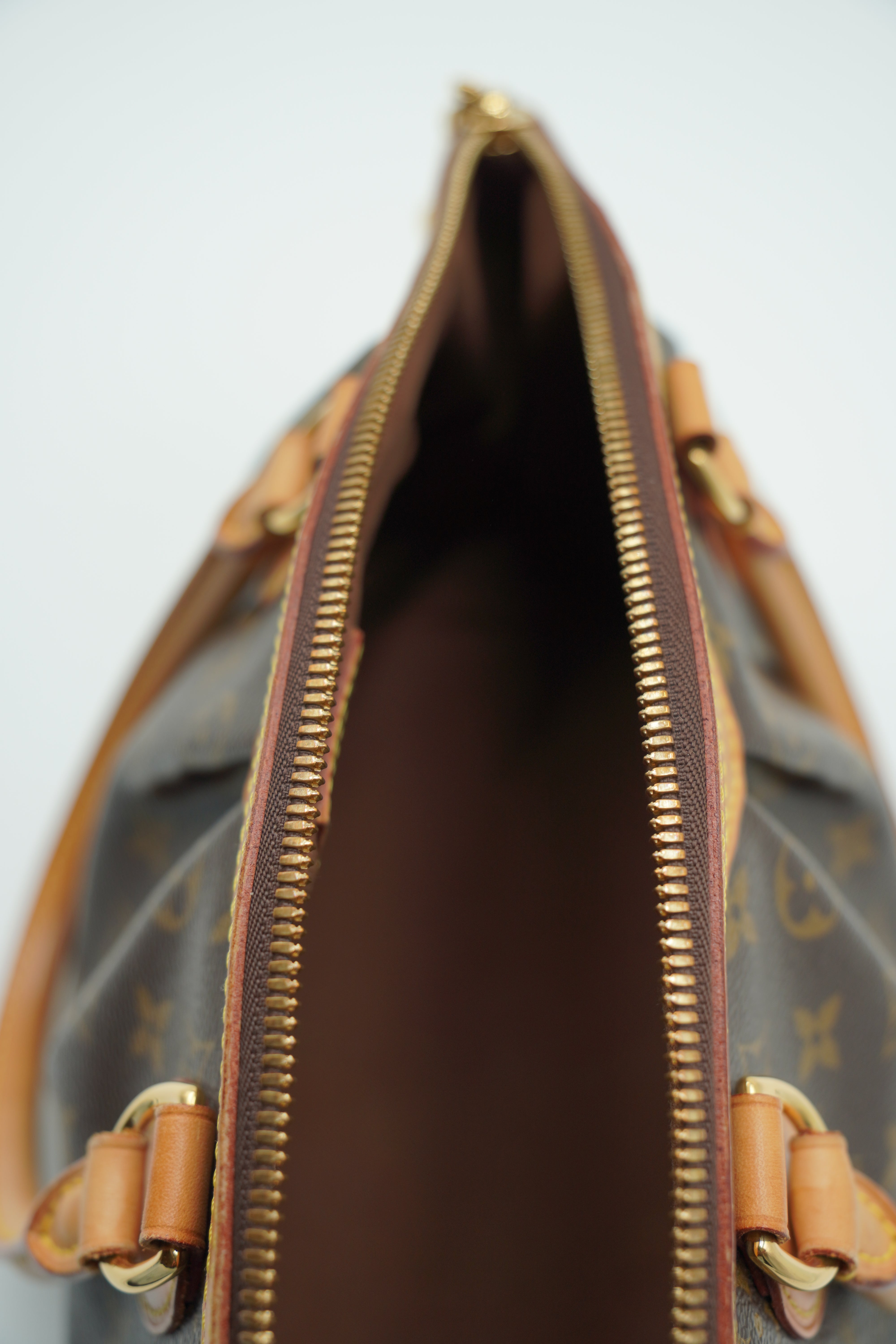 Louis Vuitton Tivoli Monogram Borsa - Aurea Luxury Lab