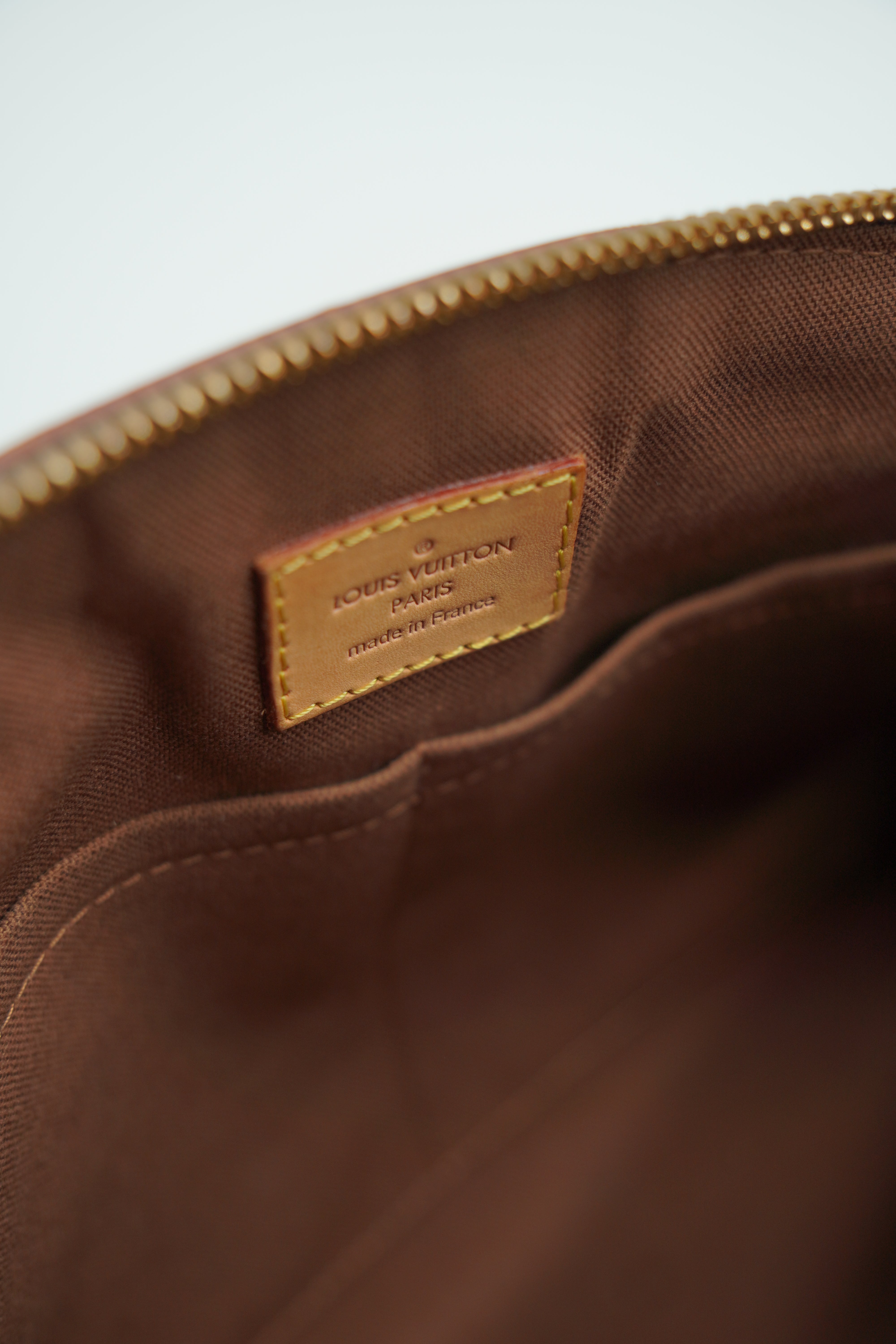 Louis Vuitton Tivoli Monogram Borsa - Aurea Luxury Lab