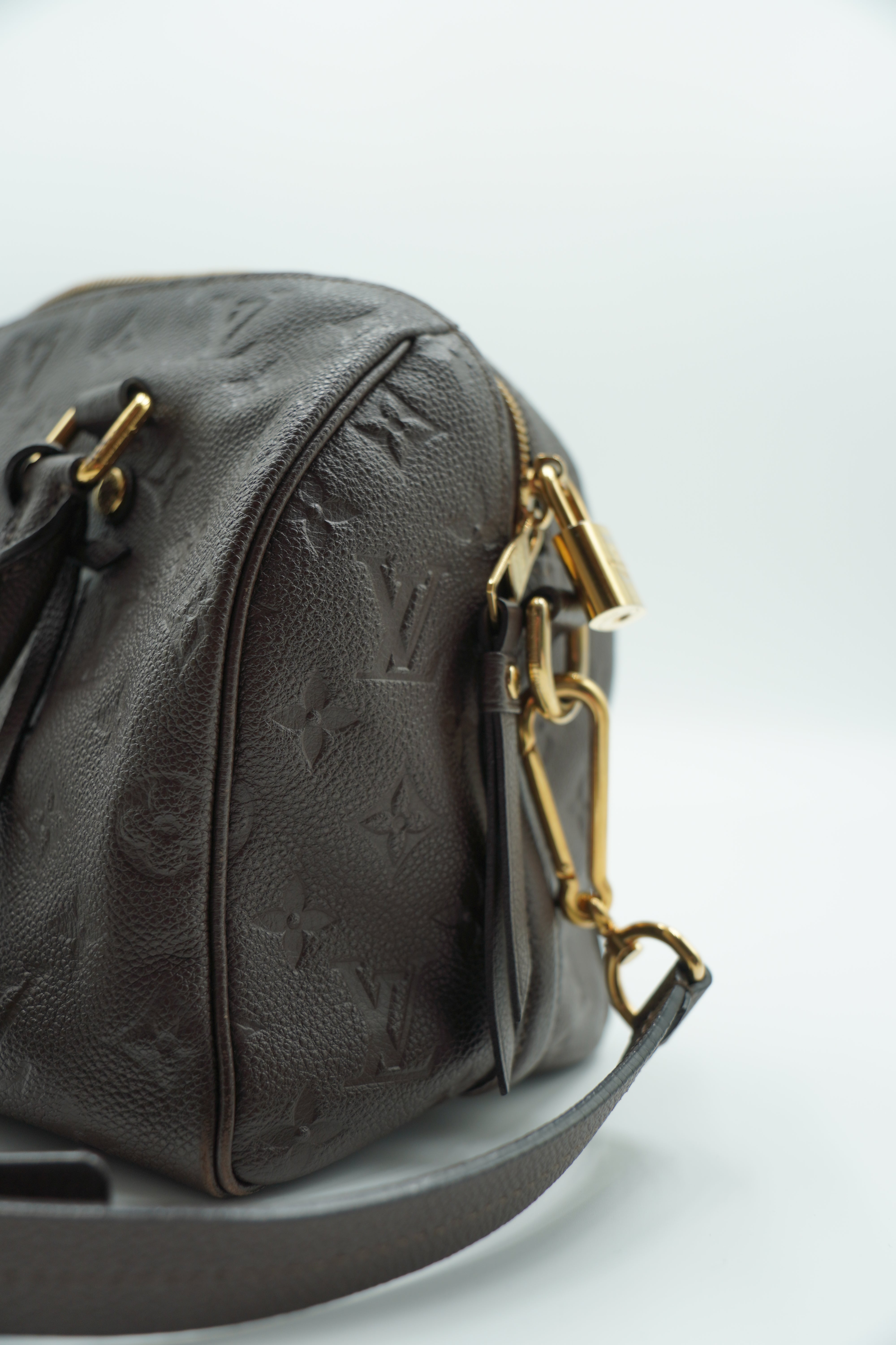Louis Vuitton Speedy Bandoulière 25 Bolso de cuero Empreinte Monogram Castaño
