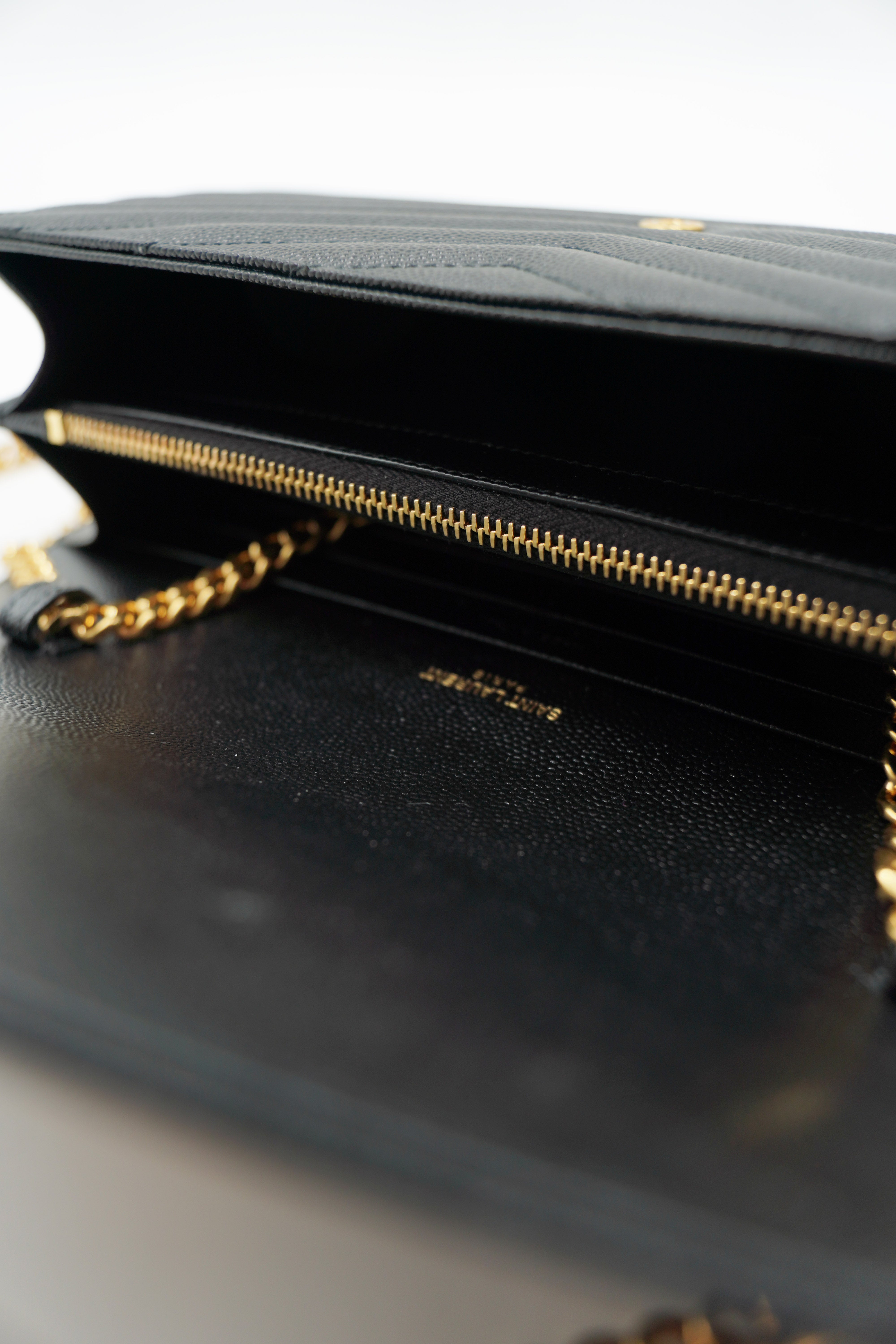 Saint Laurent Leather Clutch Bag with Black Leather Chain