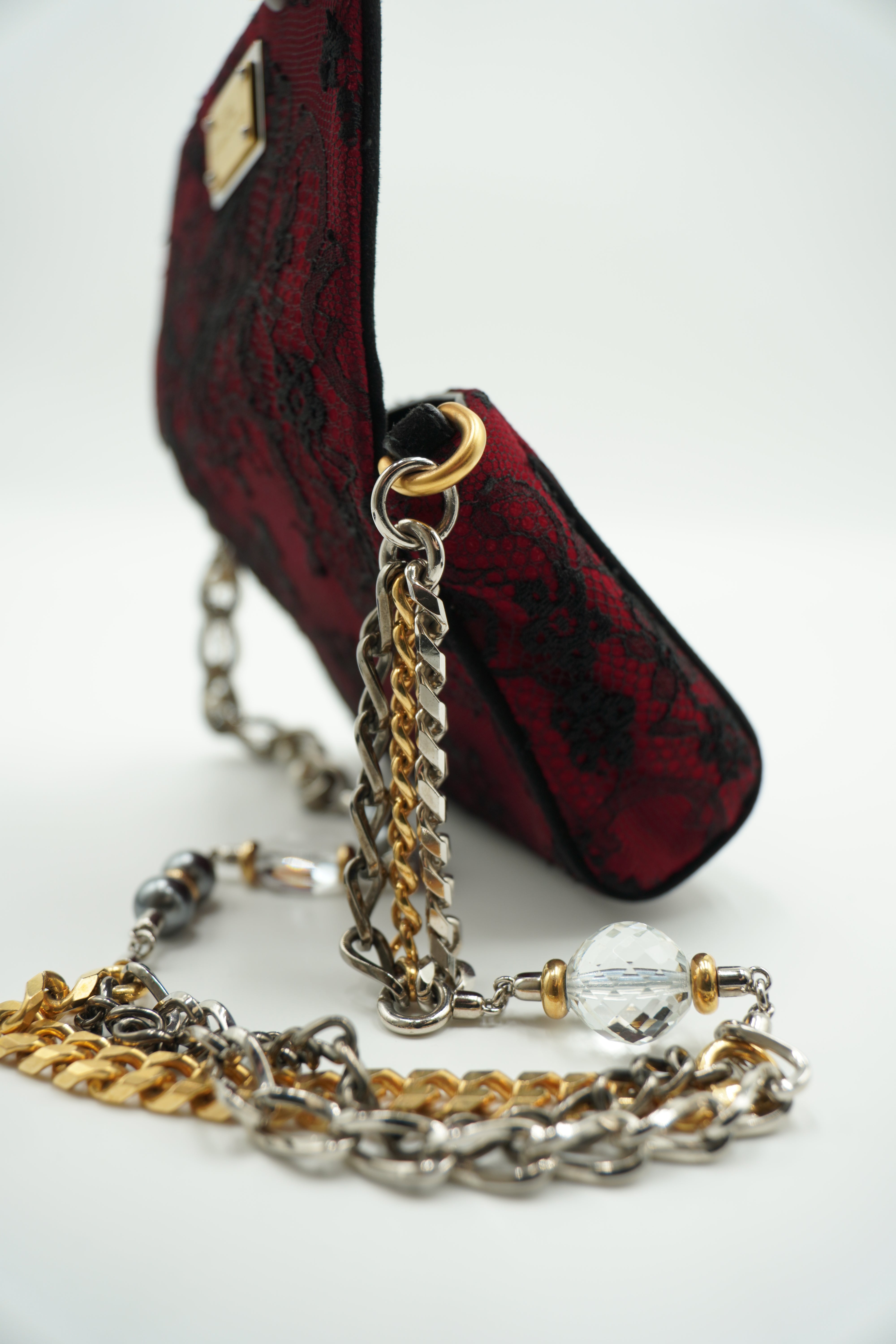 Bolso Dolce &amp; Gabbana de ante rojo y encaje negro