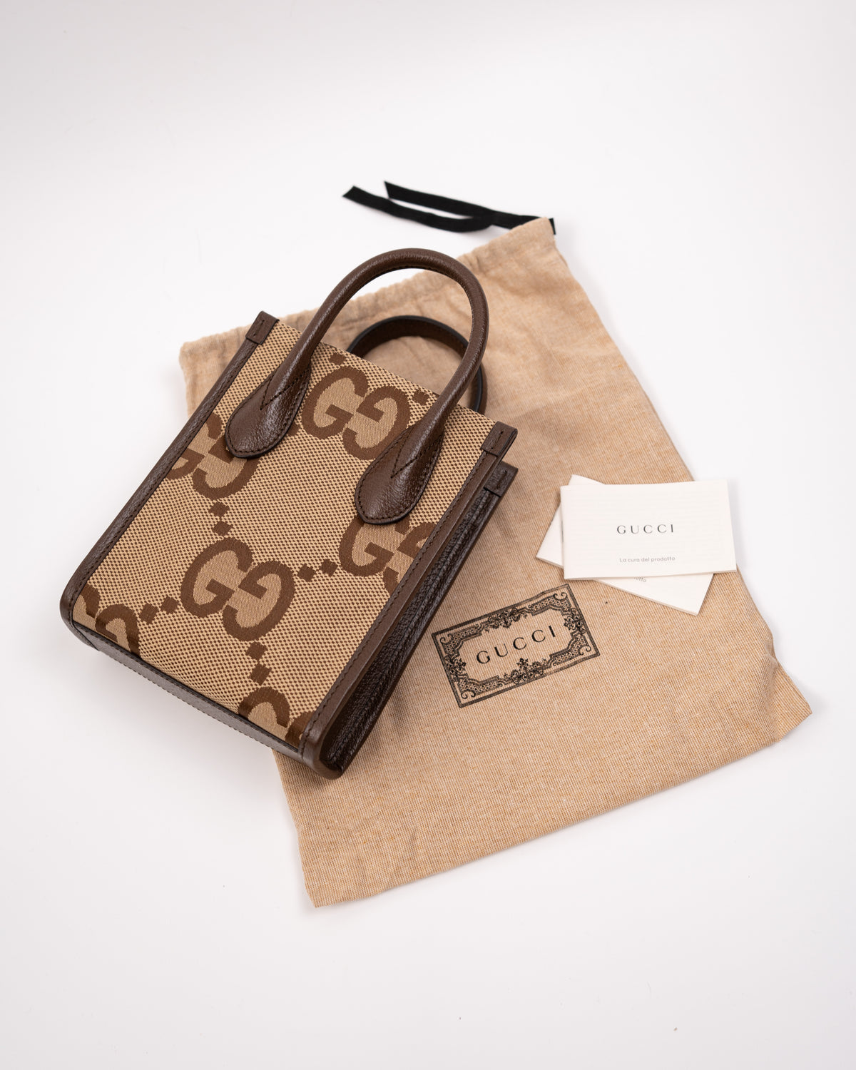 Gucci Borsa Jumbo GG Mini Tote Verticale Tela GG Marrone preloved luxury certificata - Aurea Luxury Lab