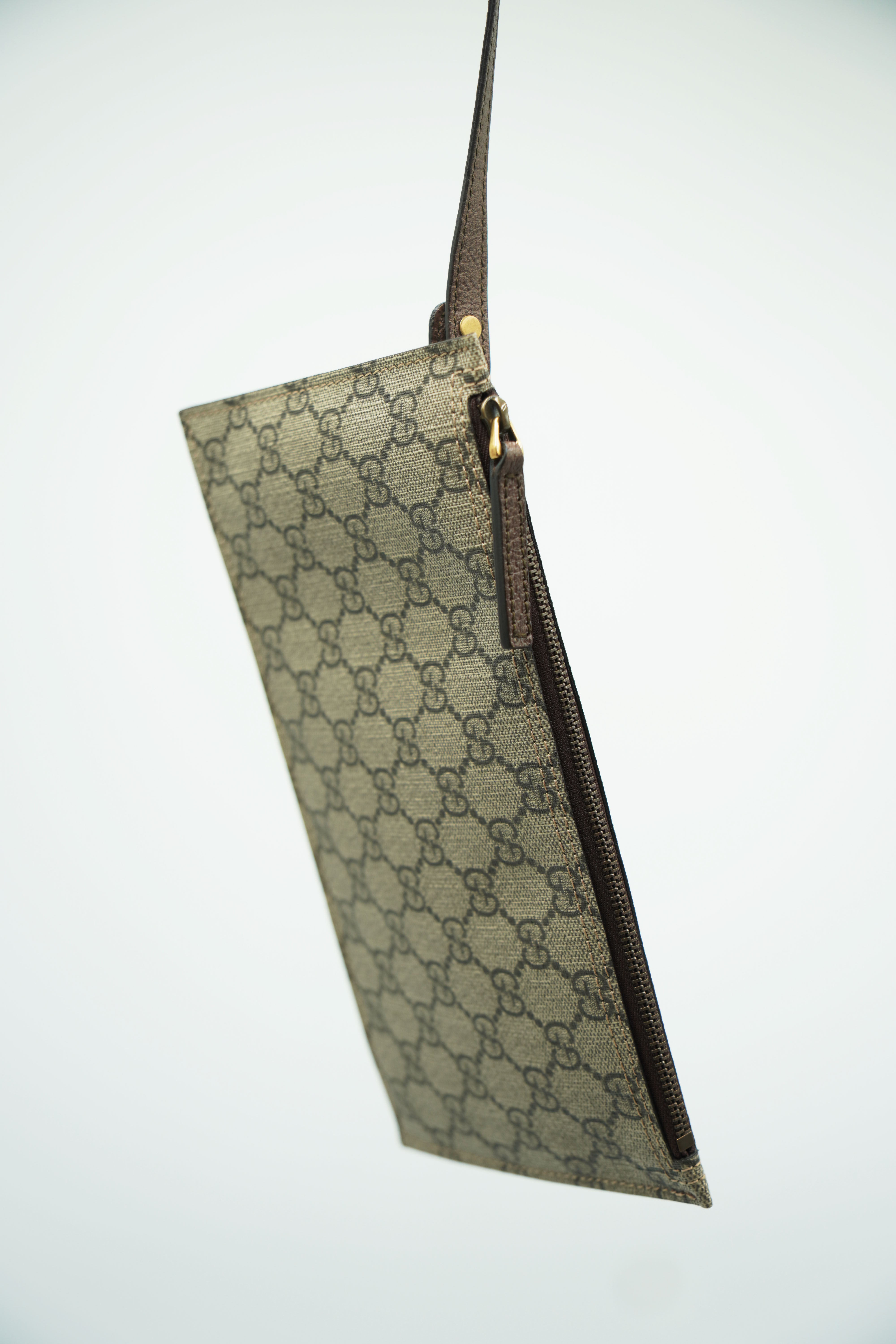 Gucci Monogram Canvas Clutch