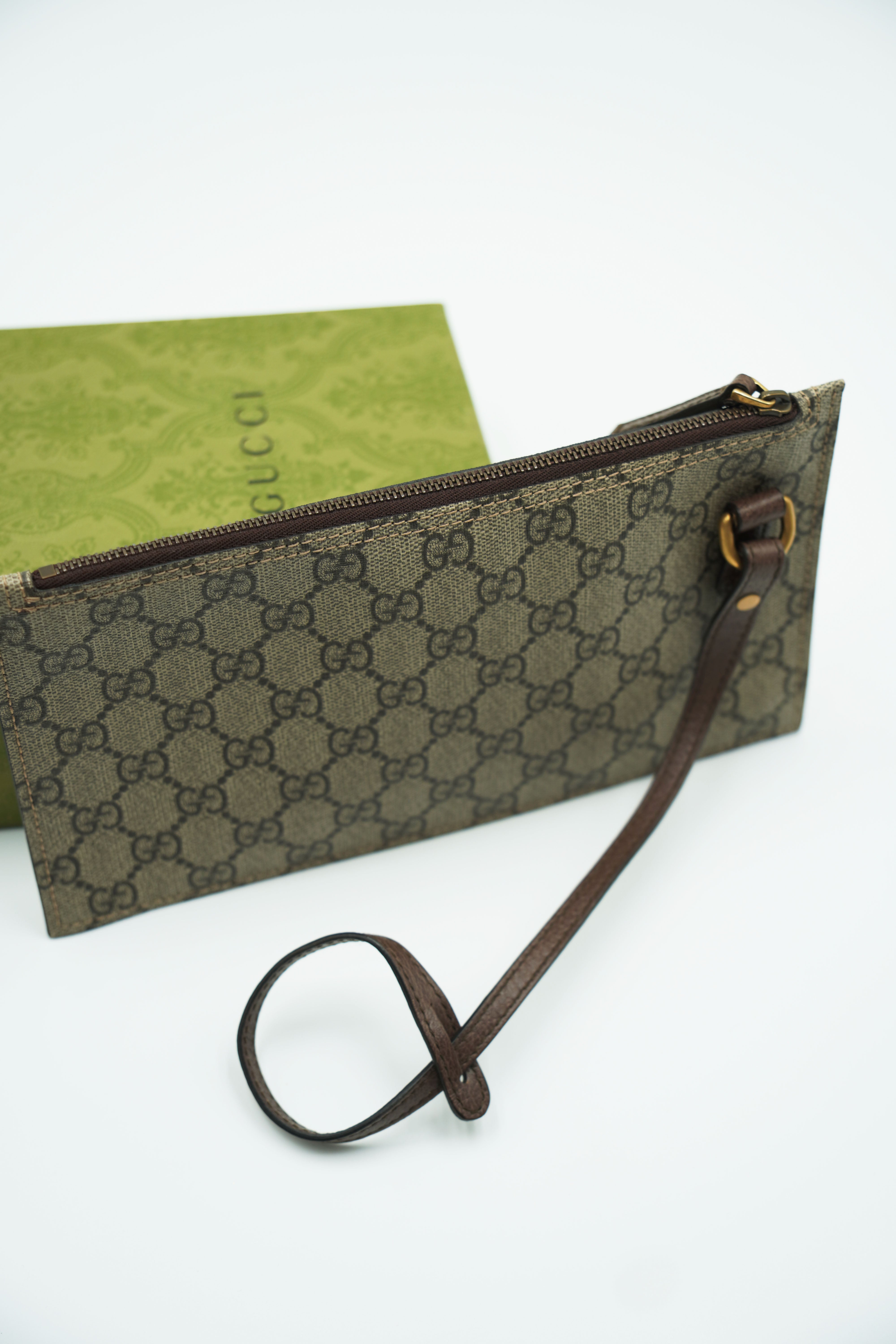 Gucci Monogram Canvas Clutch