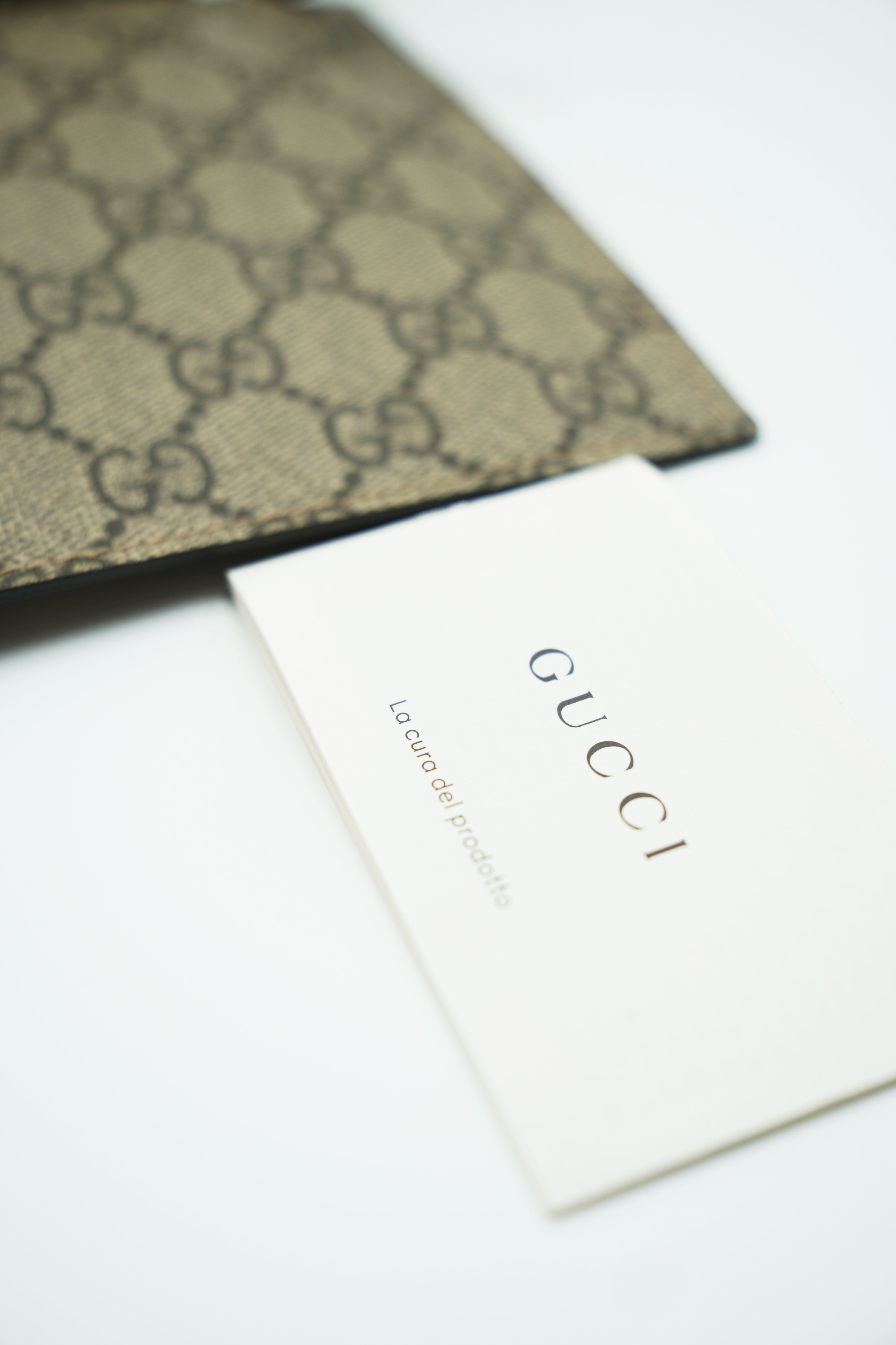 Gucci Monogram Canvas Clutch