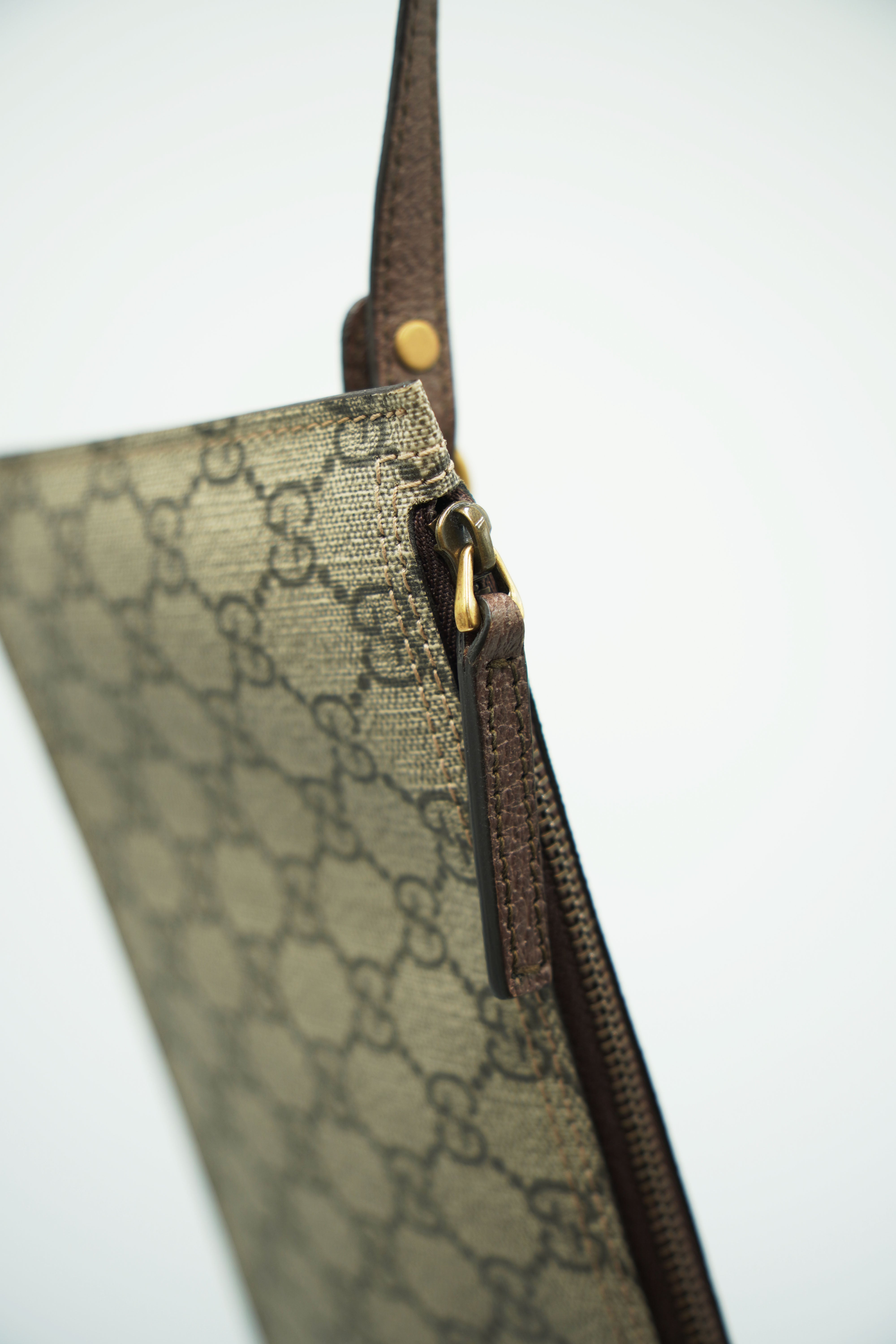Gucci Monogram Canvas Clutch