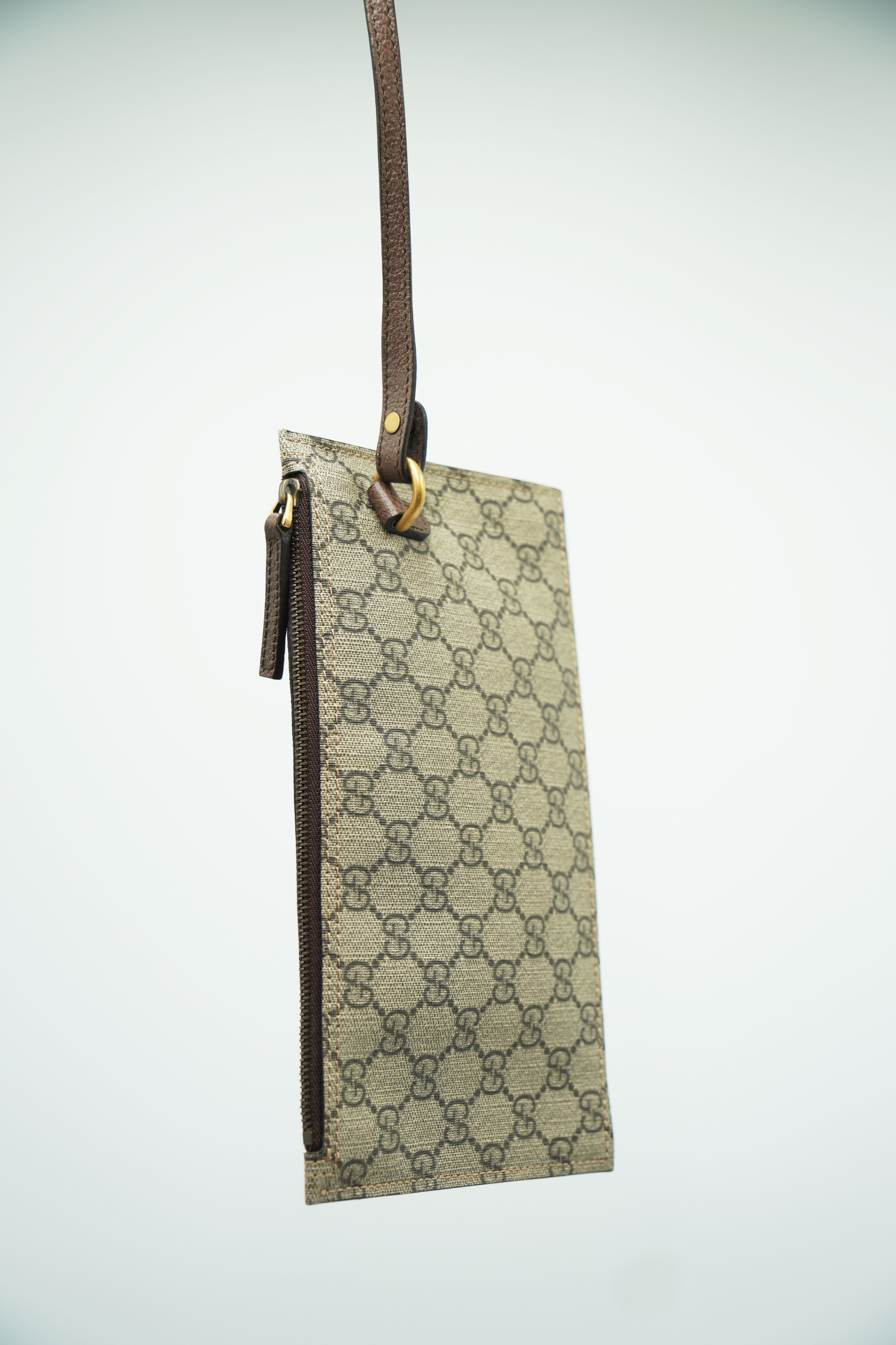 Gucci Monogram Canvas Clutch