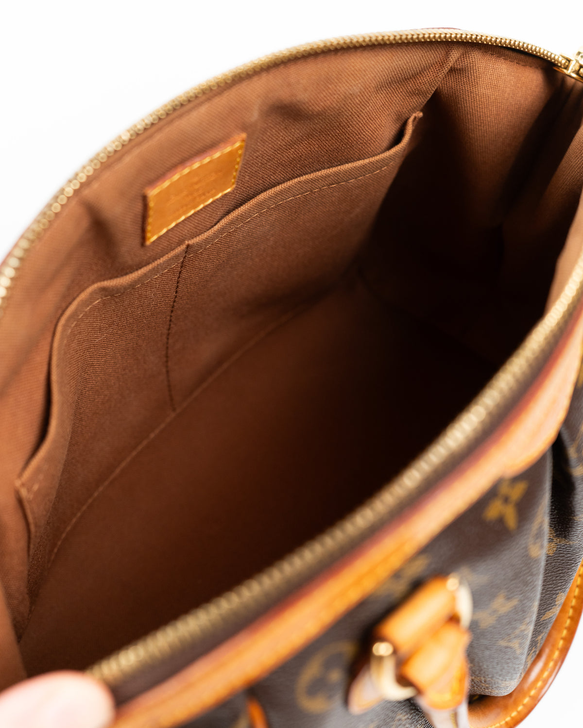 Louis Vuitton Borsa Tivoli PM Tela Monogram interno usata autentica - Aurea Luxury Lab