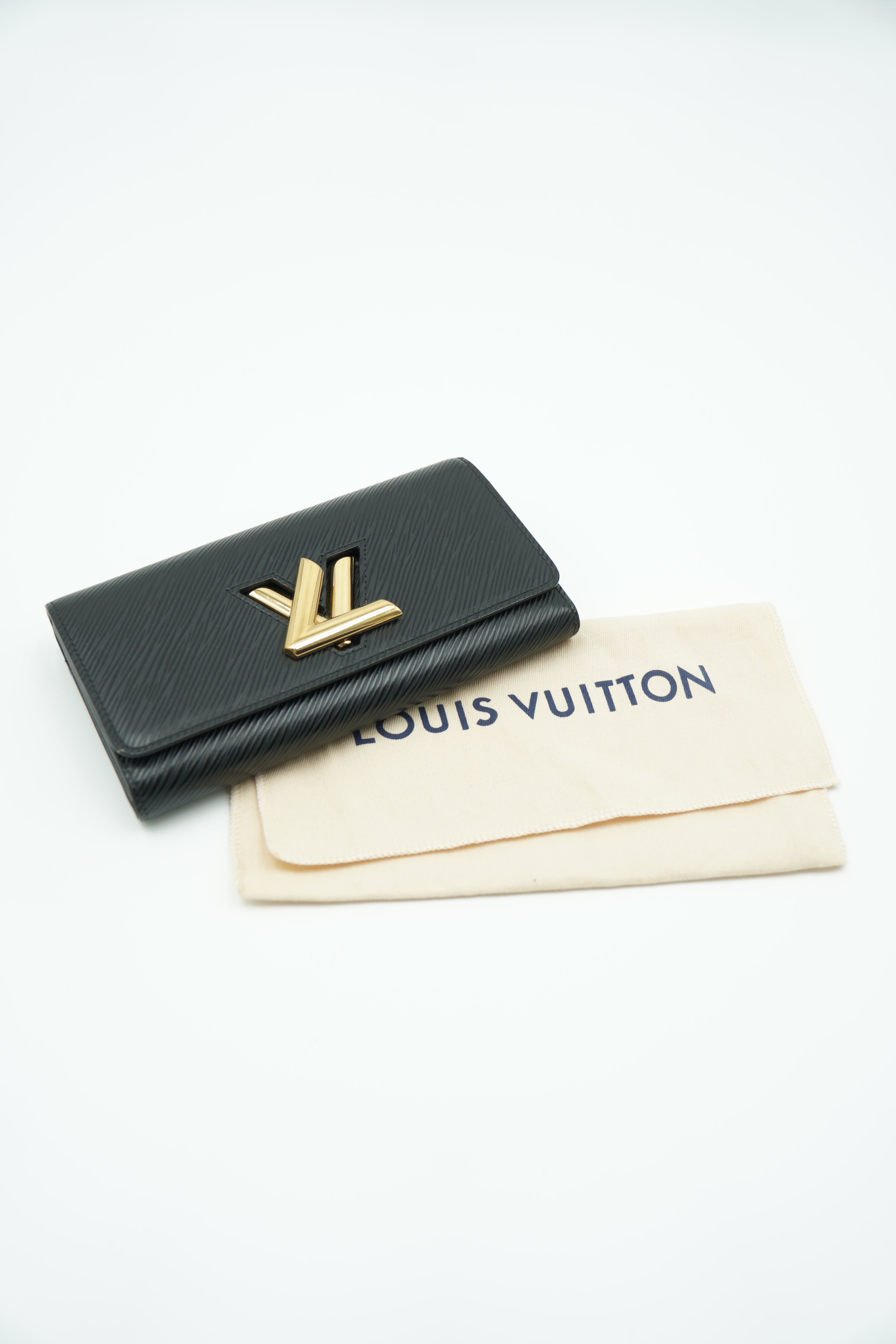 Cartera con monograma Louis Vuitton Emilie