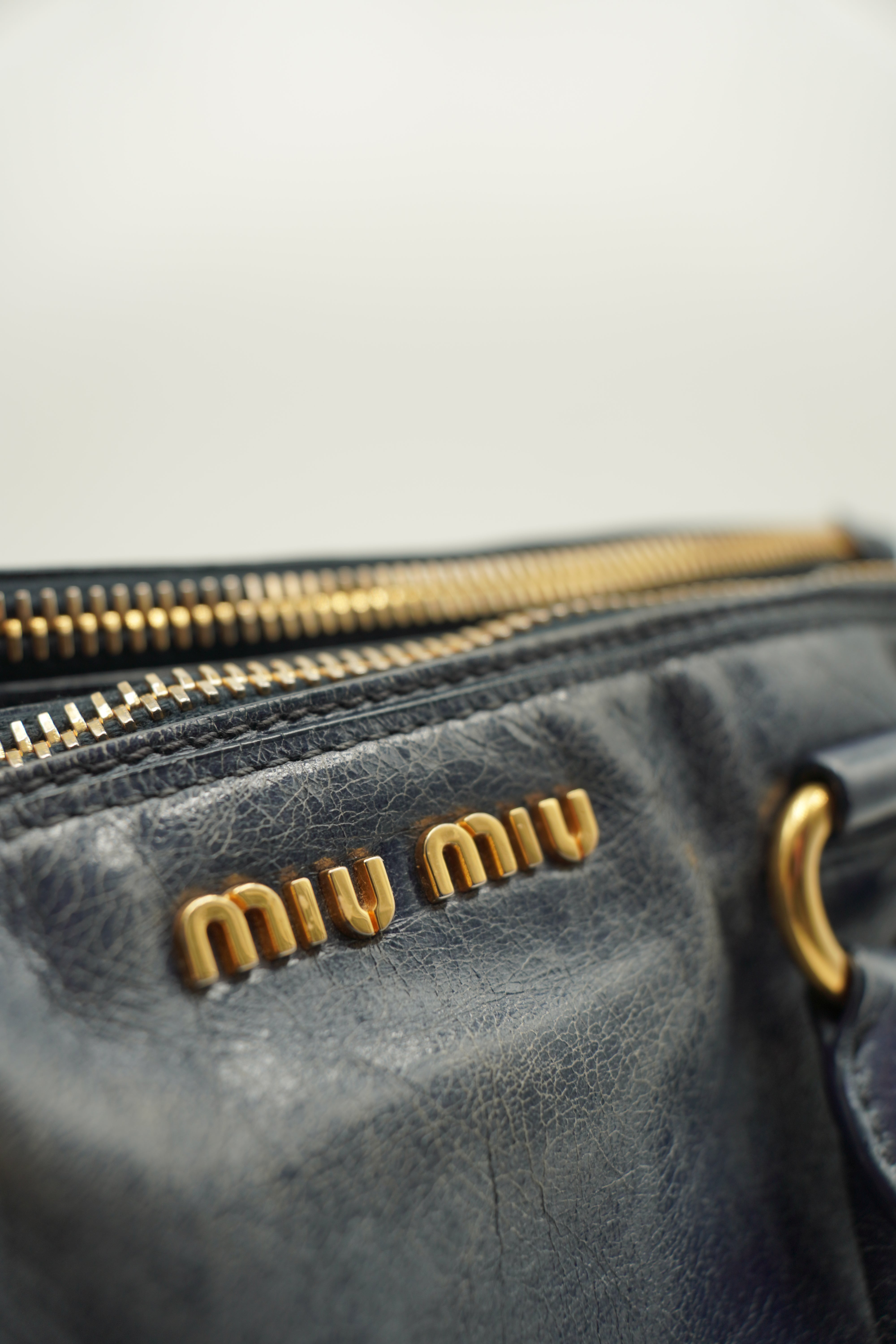 MiuMiu Borsa a mano con tracolla Shine Blu