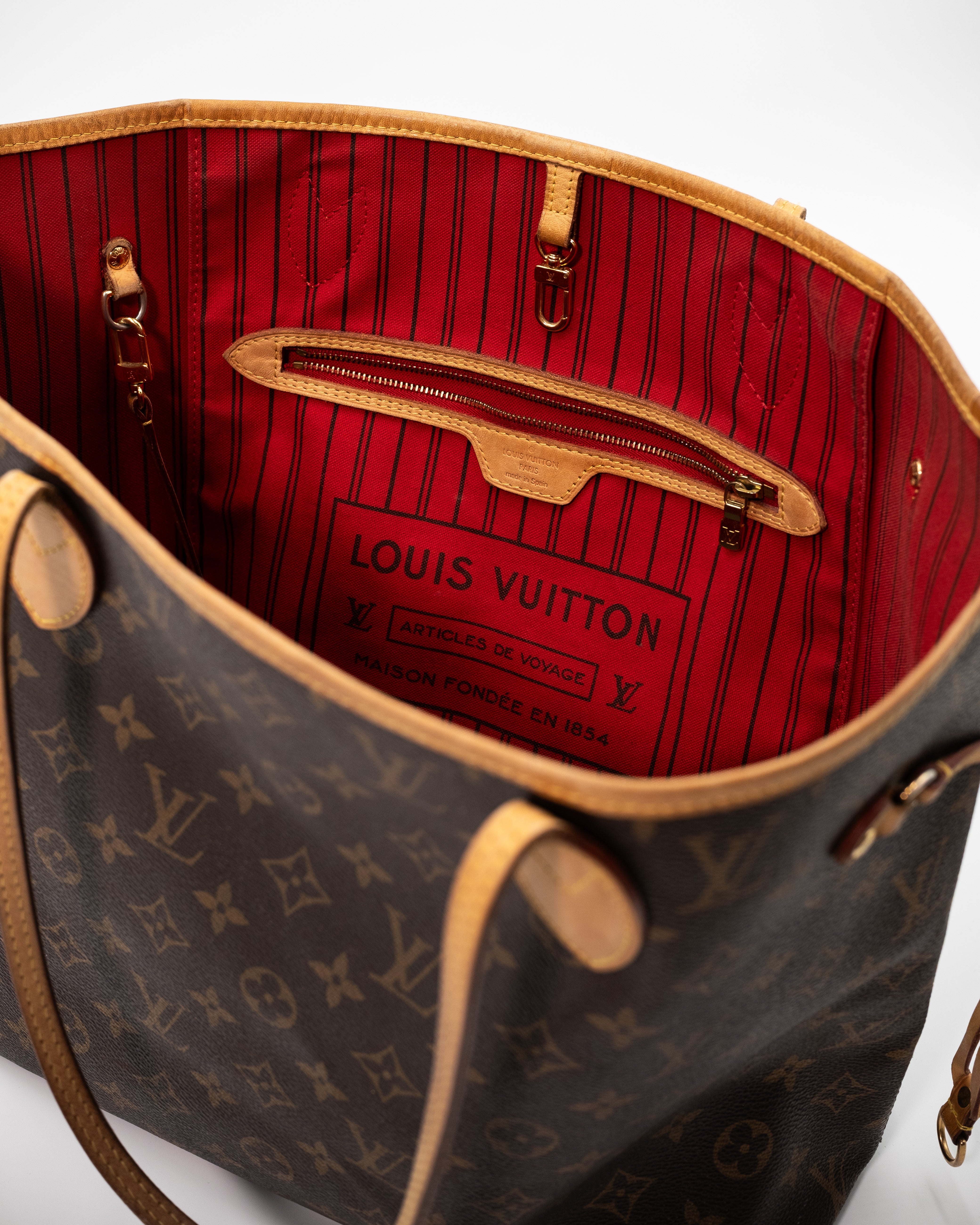 Louis Vuitton Borsa Neverfull MM Tela Monogram Marrone second hand luxury - Aurea Luxury Lab