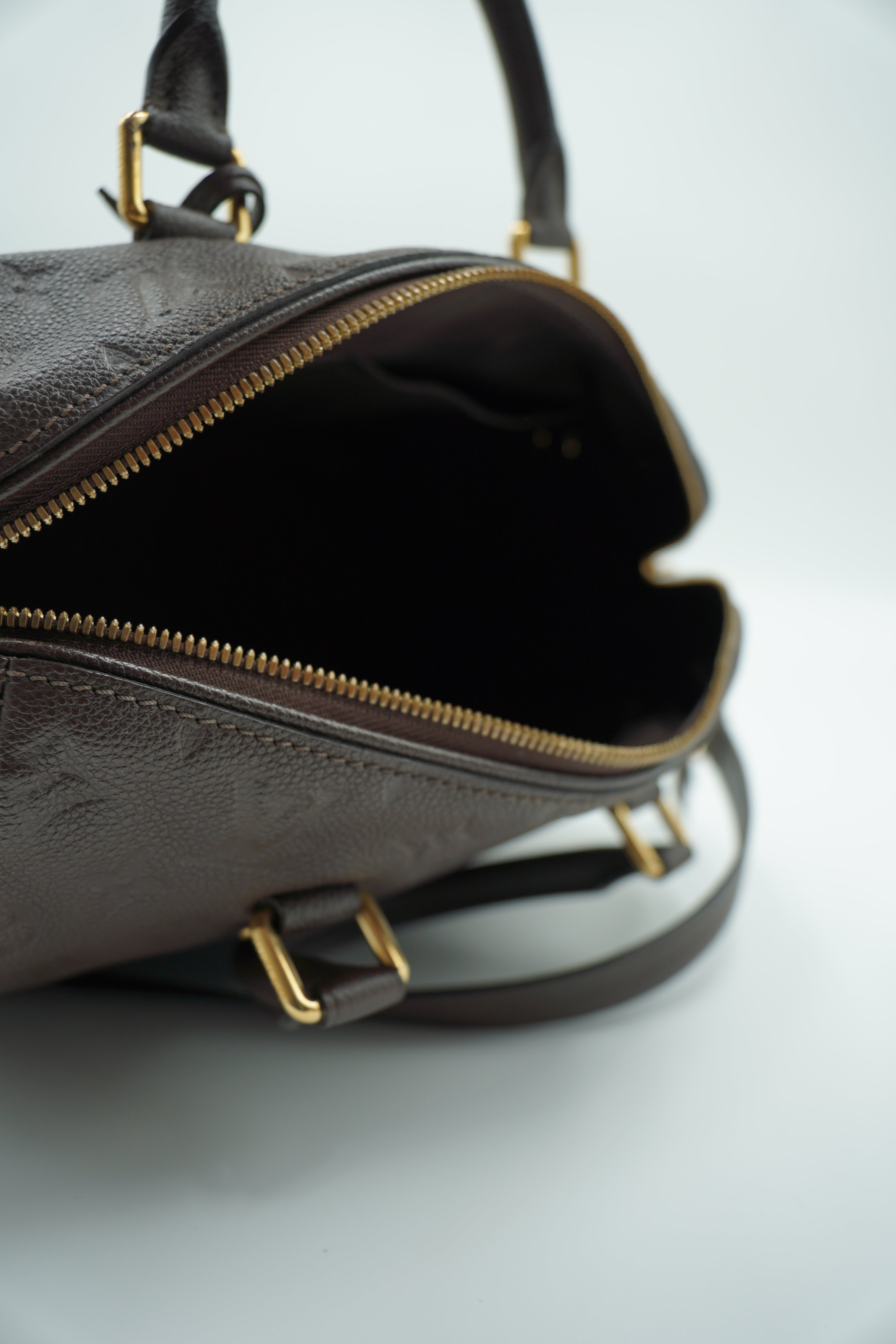 Louis Vuitton Speedy Bandoulière 25 Bolso de cuero Empreinte Monogram Castaño