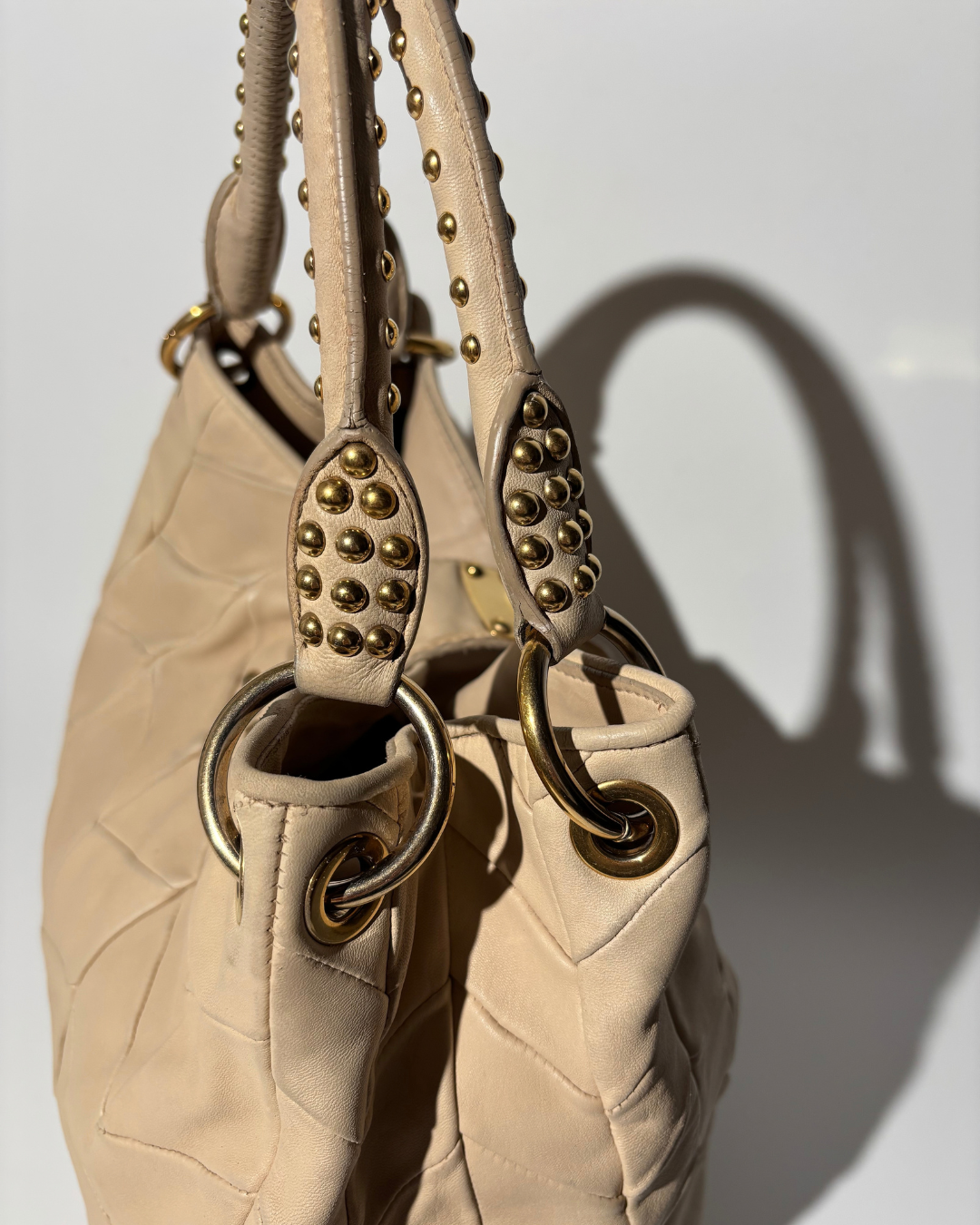 Miu Miu Borsa Hobo Vintage Pelle Nappa Panna fondo pre-owned certificata - Aurea Luxury Lab